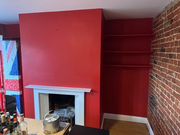 Feature wall and fireplace area – painting & decorating in Norwich